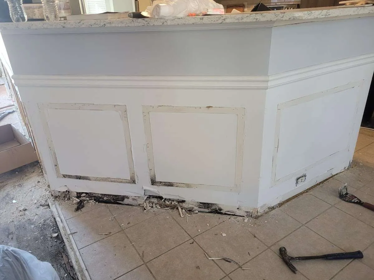 Water damage and mold on kitchen during Storm Damage Restoration in Corcoran